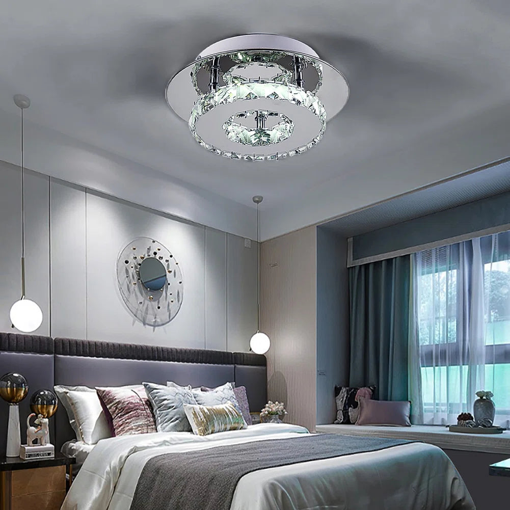 Tarren Glass LED flush mount ceiling light by TheChandelierCo featuring a modern glass design and LED illumination.