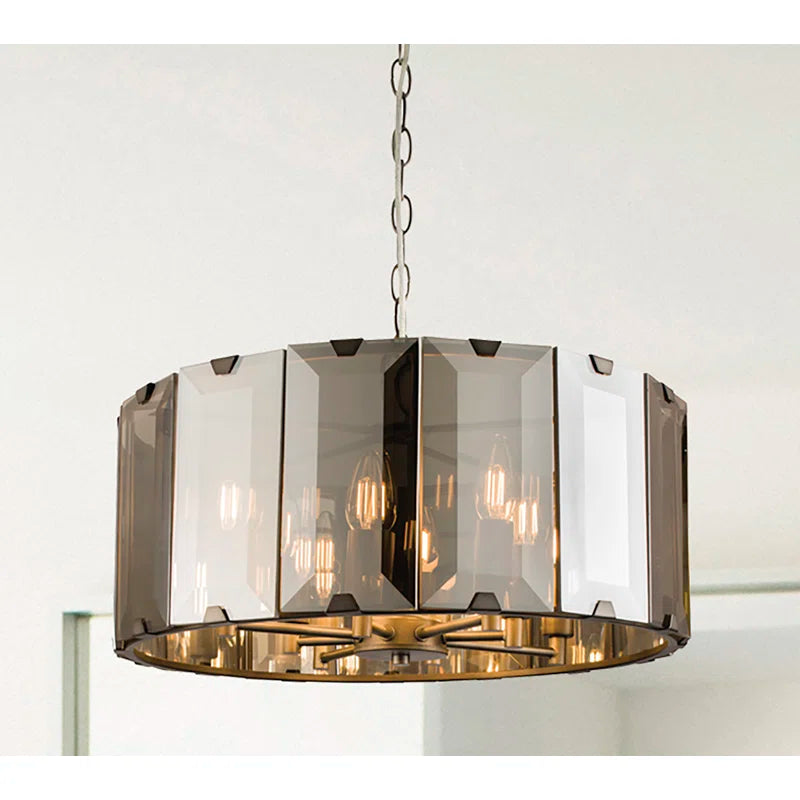 Light drum chandelier by TheChandelierCo featuring a modern design with eight drum-shaped lampshades.