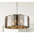 Light drum chandelier by TheChandelierCo featuring a modern design with eight drum-shaped lampshades.