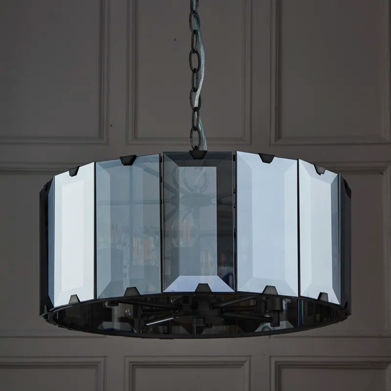 Tedrow 8 light drum chandelier by TheChandelierCo featuring a sleek drum shade and modern design hanging from a metal frame.