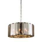 Tedrow 8 light drum chandelier by TheChandelierCo featuring a modern drum shade with eight light bulbs, perfect for contemporary interiors.