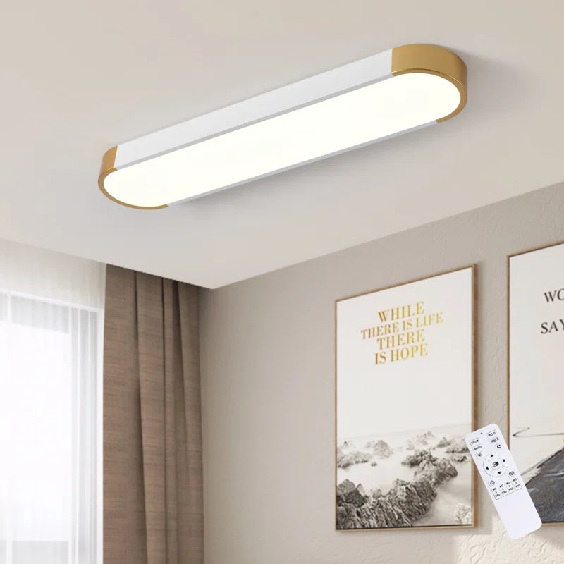 White and gold Cherron 1-light 70cm LED flush mount ceiling light by TheChandelierCo, showcasing a sleek, modern design.