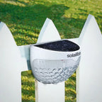 Set of two white 4.5cm H solar-powered LED outdoor bulkhead lights from TheChandelierCo, mounted on exterior walls.