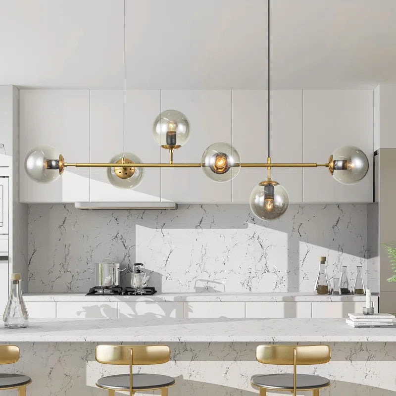 Light gold Worthington 6 linear Sputnik chandelier with globe glass bubbles, pendant lamp for kitchen island lighting by TheChandelierCo.