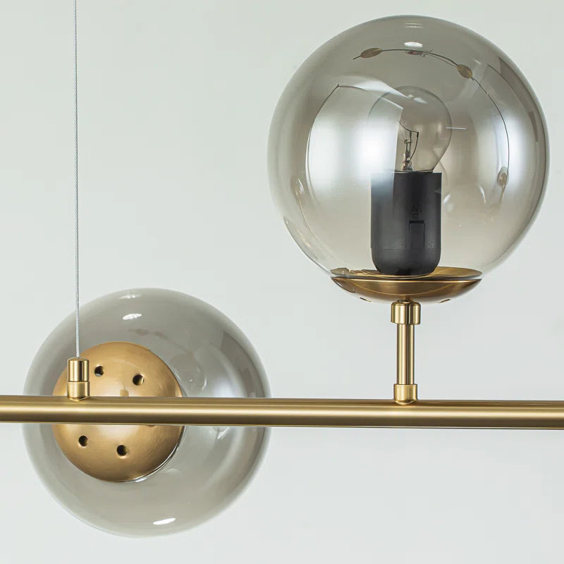 Light gold Worthington 6 linear Sputnik chandelier with globe glass bubbles, kitchen island pendant lamp by TheChandelierCo.