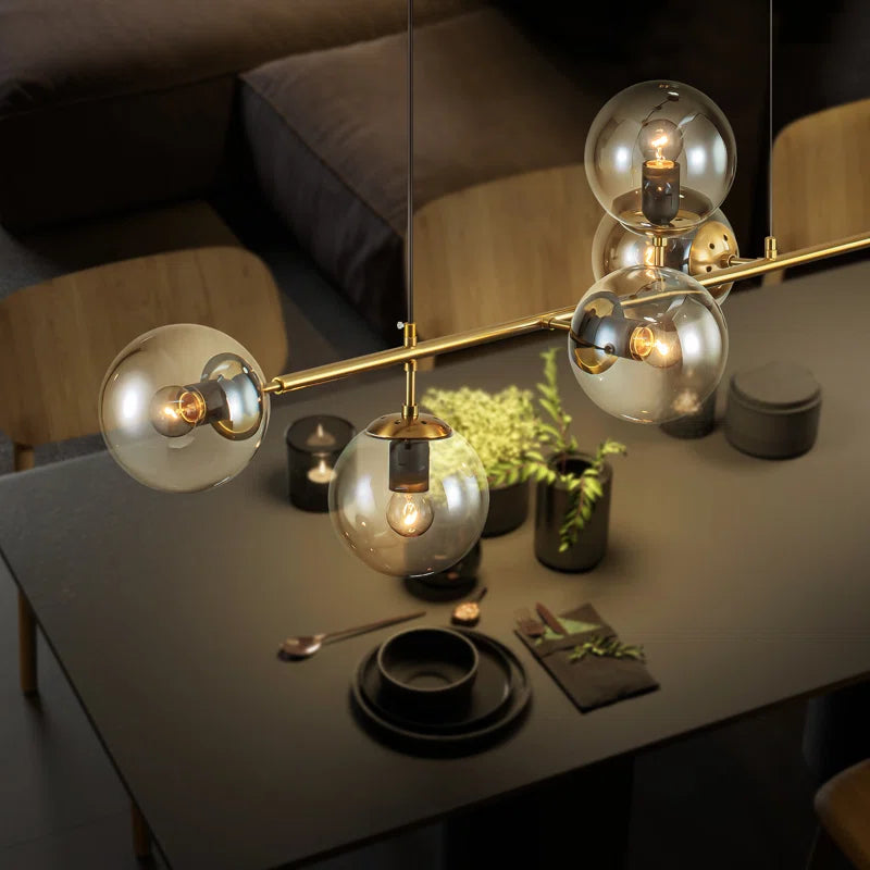 Light gold linear Sputnik chandelier with globe glass bubbles, modern kitchen island pendant lamp by TheChandelierCo.