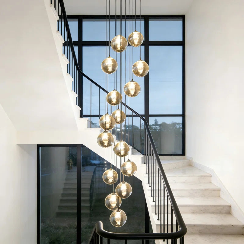Light silver cluster pendant from Amice 15 collection by TheChandelierCo featuring amber-colored glass elements on a silver chain.