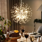 Dandelion 8-light Sputnik crystal chandelier by TheChandelierCo with starburst sunburst design and hanging crystal accents.