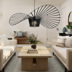 Light black Carlose 1 pendant by TheChandelierCo featuring a unique, statement design hanging from a sleek chain.