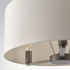 Elegant Katrina 3 light drum chandelier by TheChandelierCo with a modern drum shade, perfect for stylish lighting in living spaces.